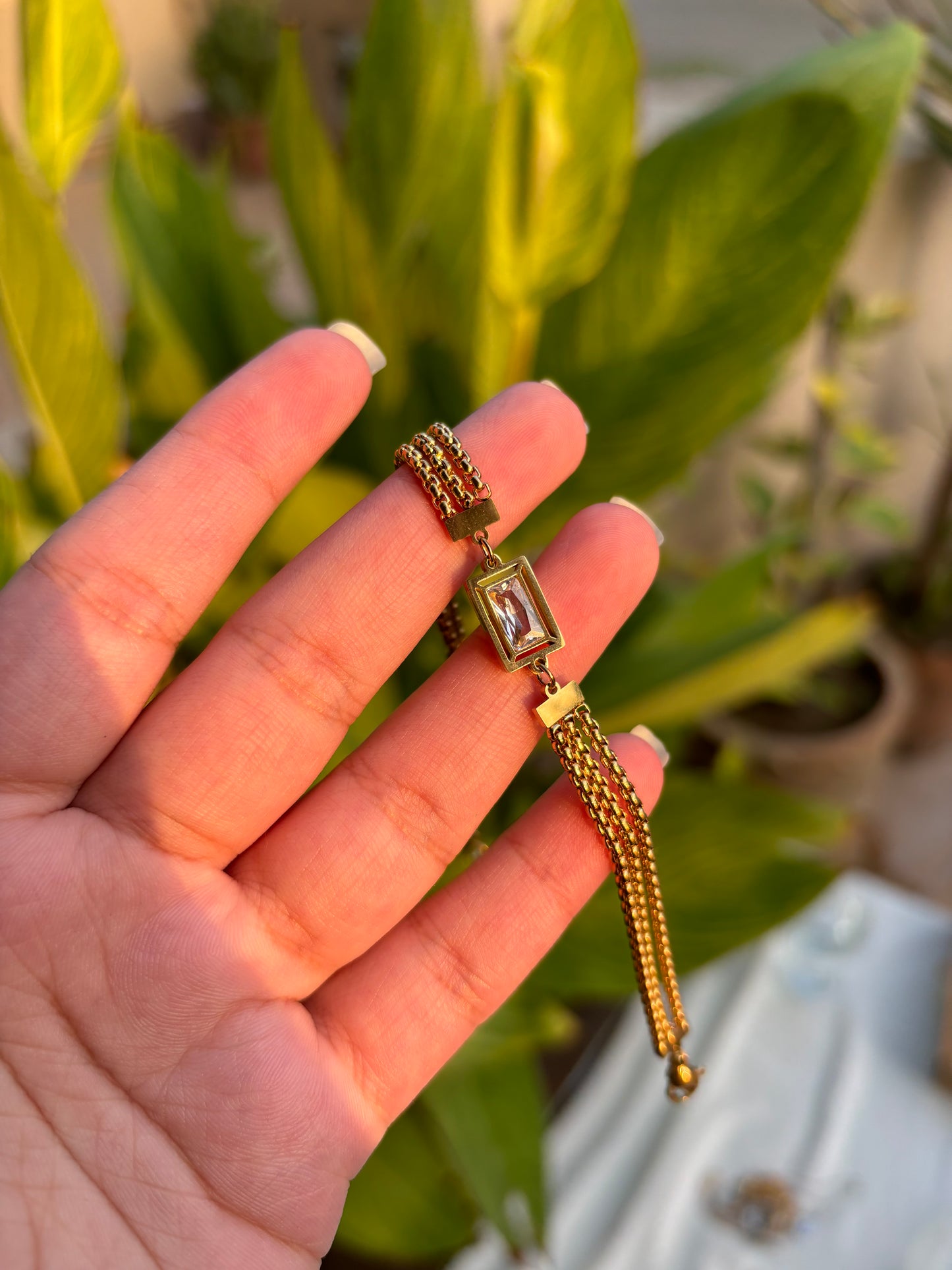 Gold Bracelet with Silver Stone