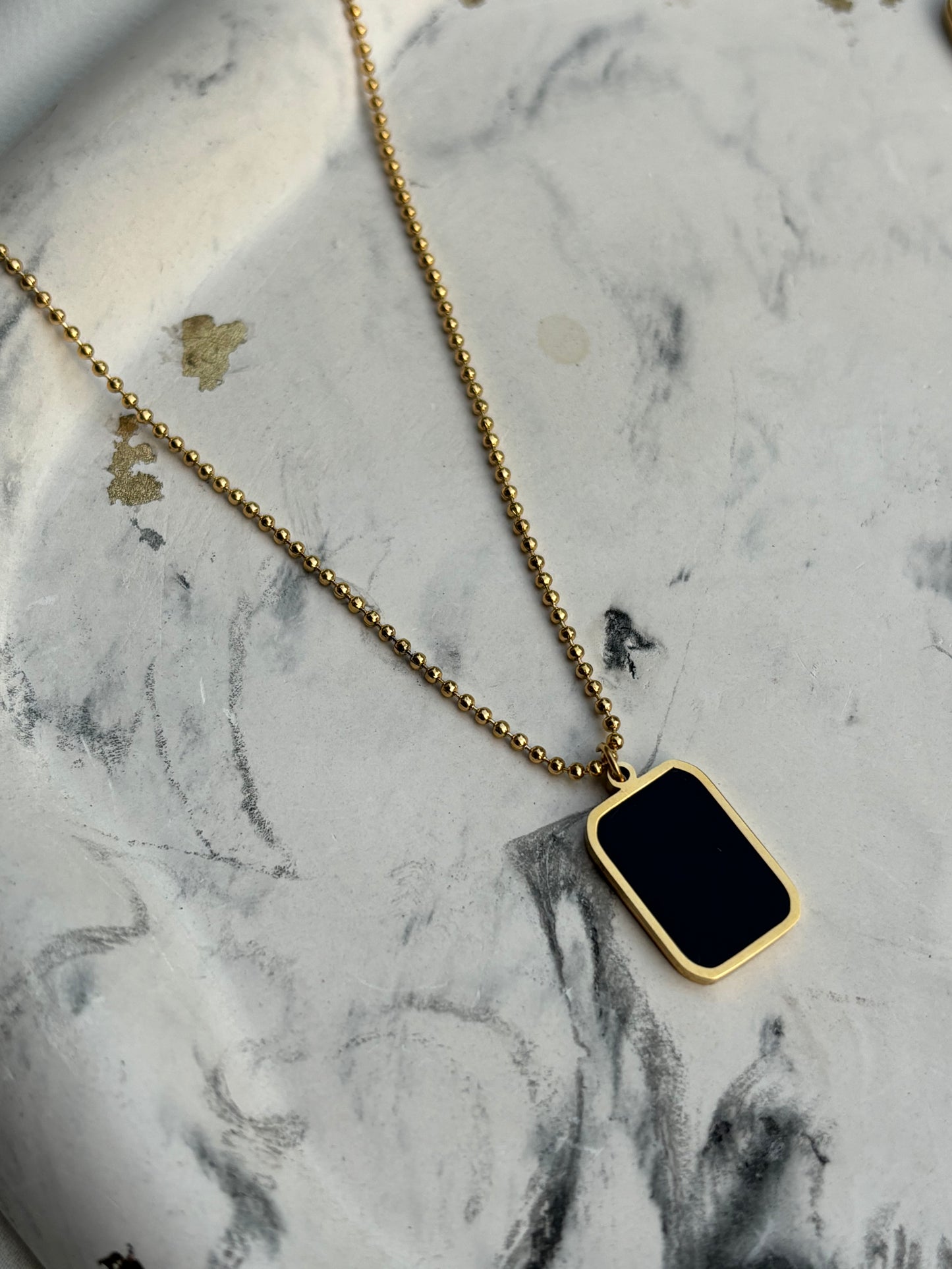 Black Stone Pendant with Gold Chain